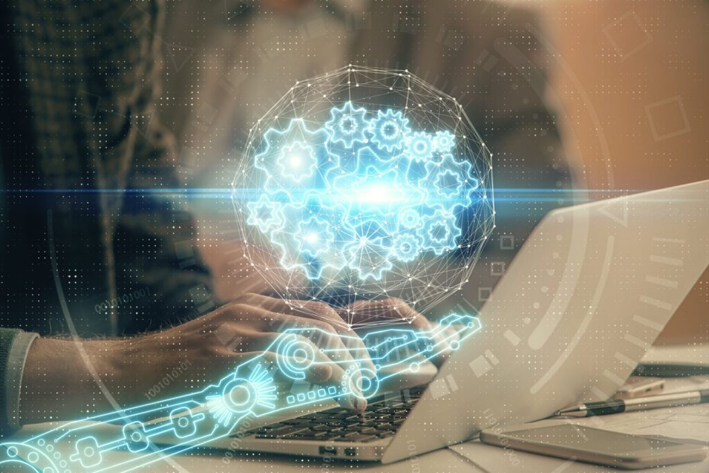 Przedsiębiorca z komputerem w tle